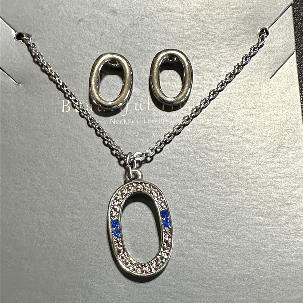 55.  Silver-tone Necklace & Earring Set